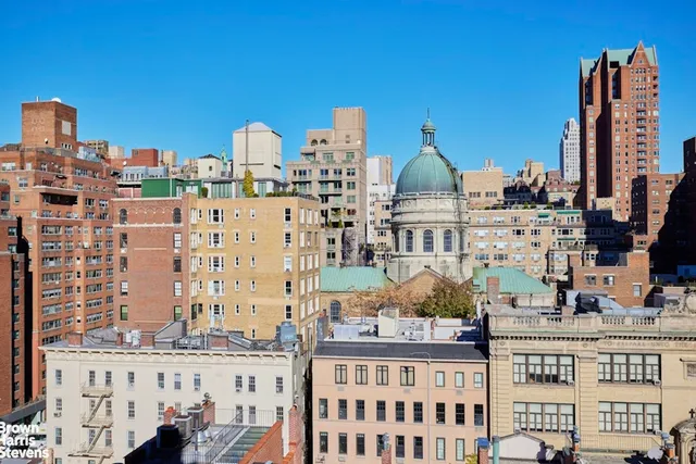 a view of a city with tall buildings
