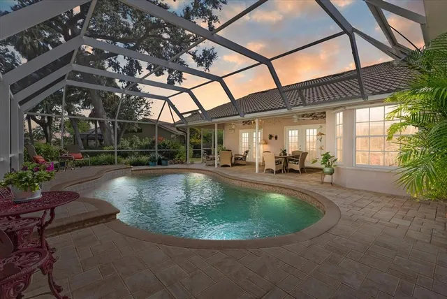 a kitchen with granite countertop cabinets stainless steel appliances and a sink