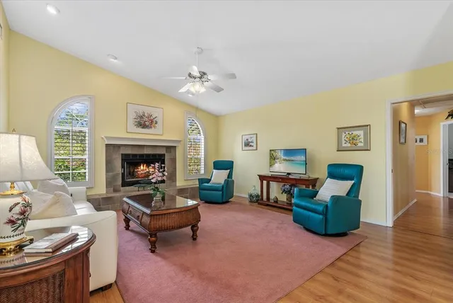 a bedroom with a bed mirror and window