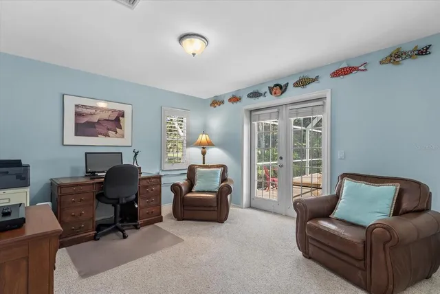 a view of a swimming pool with a patio