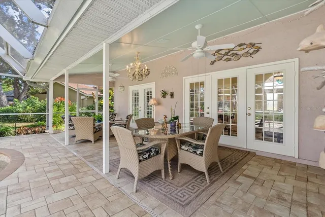 an aerial view of a house with a backyard