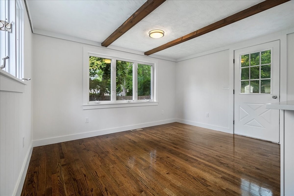 5 Rondeau Road Bellingham, MA 02019 - Photo 16 of 32 an empty room with wooden floor and windows