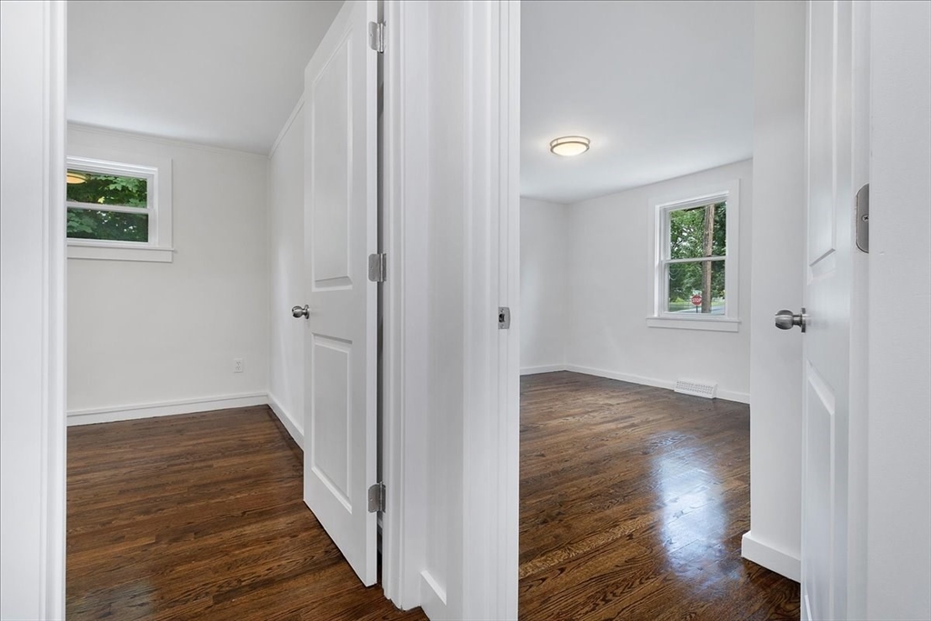 5 Rondeau Road Bellingham, MA 02019 - Photo 20 of 32 an empty room with wooden floor and windows