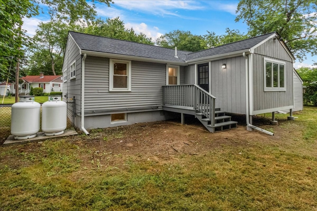 5 Rondeau Road Bellingham, MA 02019 - Photo 8 of 32 a house view with a backyard space
