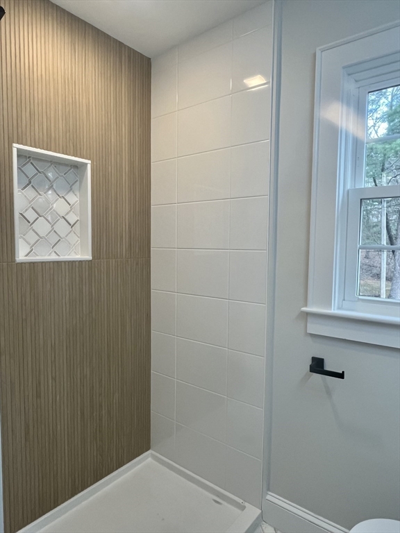 11 Park Lane Walpole, MA 02032 - Photo 11 of 27 a bathroom with a shower and a window