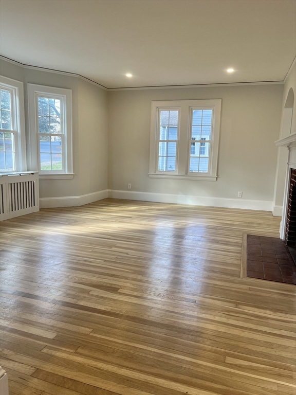 11 Park Lane Walpole, MA 02032 - Photo 14 of 27 a view of empty room with wooden floor and fan
