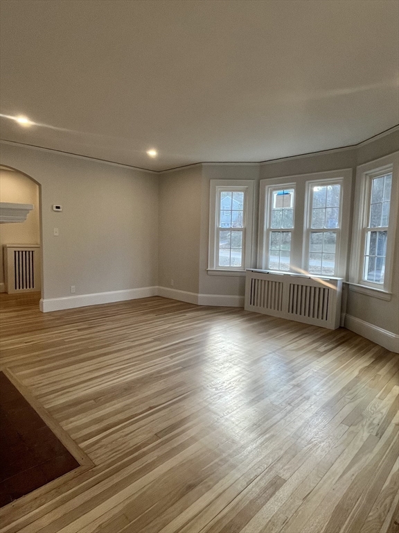 11 Park Lane Walpole, MA 02032 - Photo 15 of 27 wooden floor in an empty room with a window