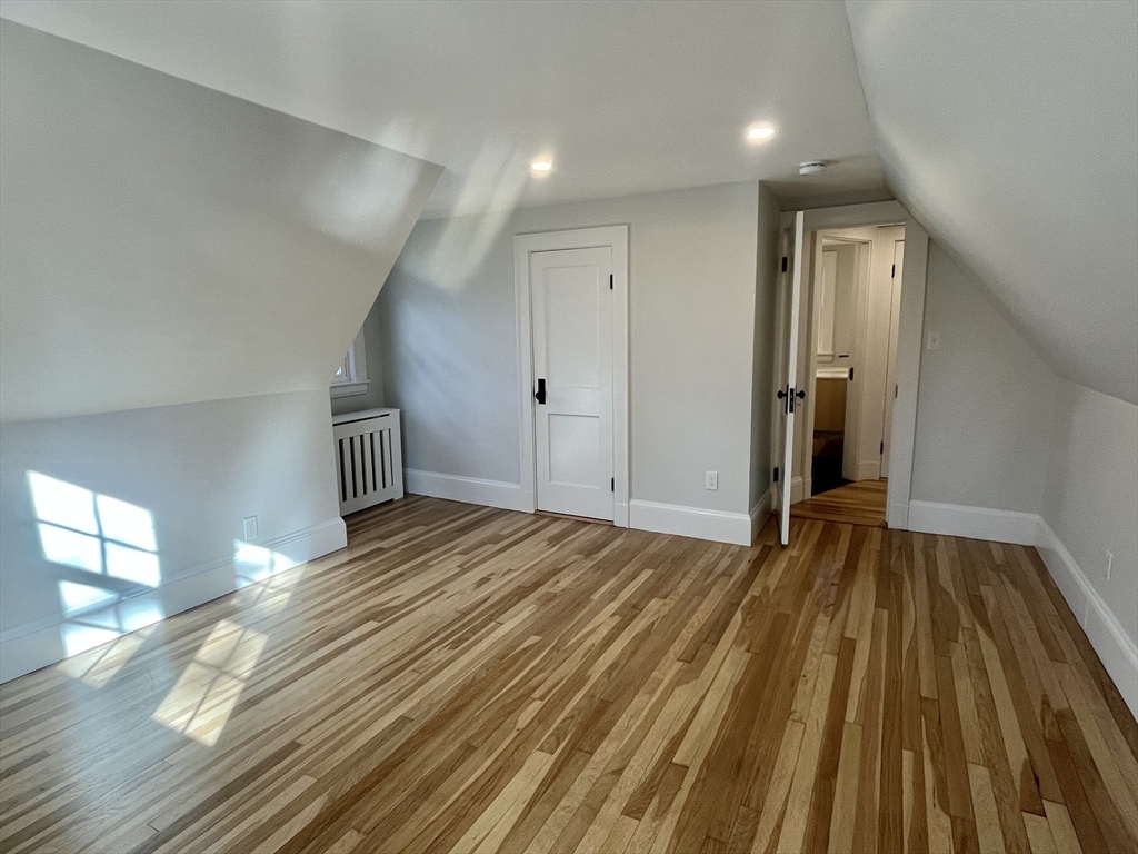 11 Park Lane Walpole, MA 02032 - Photo 23 of 27 a view of empty room with wooden floor