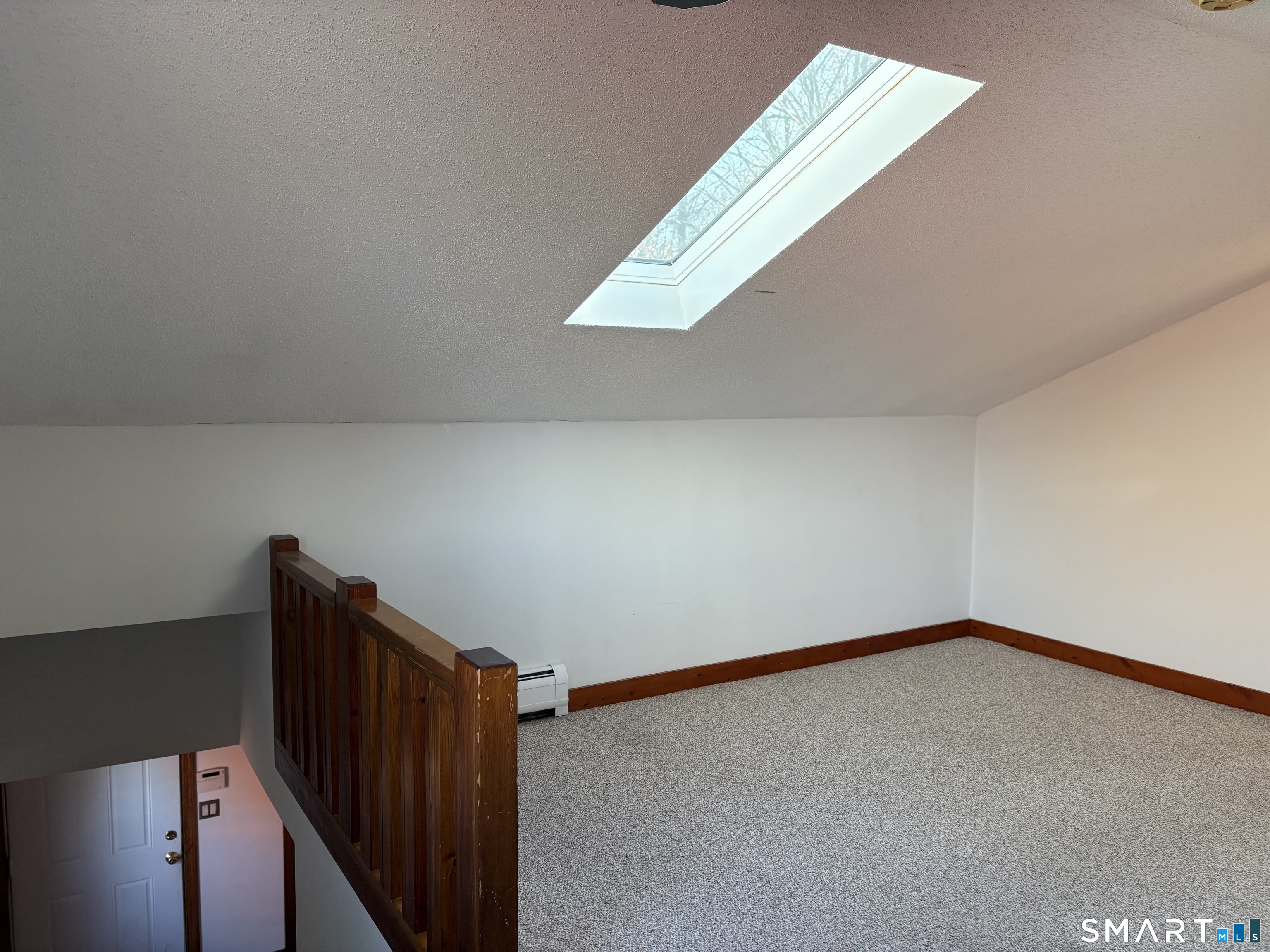693 Broad Street Meriden, CT 06450 - Photo 18 of 19 The skylight helps make the office space bright and airy.