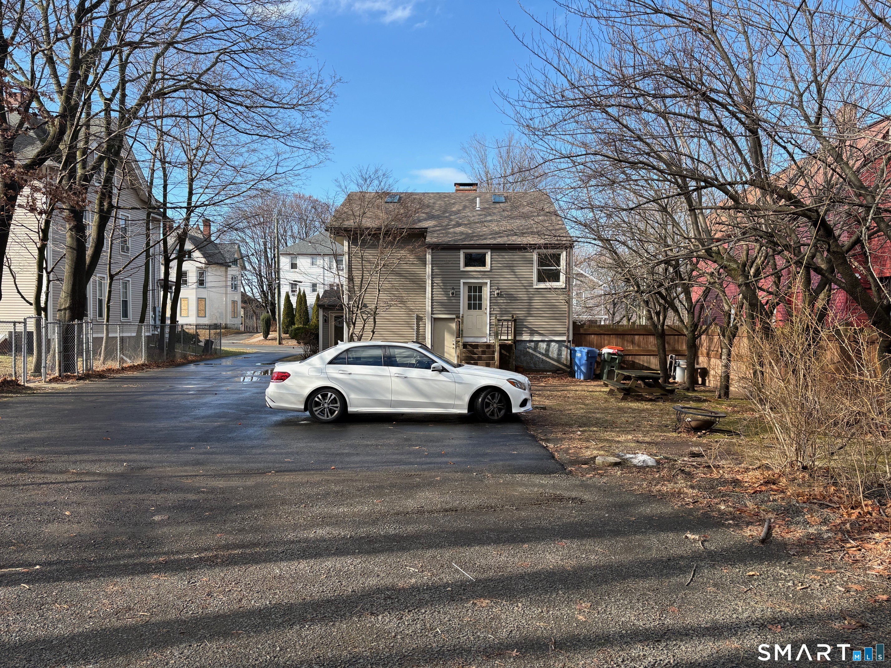 693 Broad Street Meriden, CT 06450 - Photo 3 of 19 There are 2 offstreet parking spaces and a level yard for enjoying the outdoors.