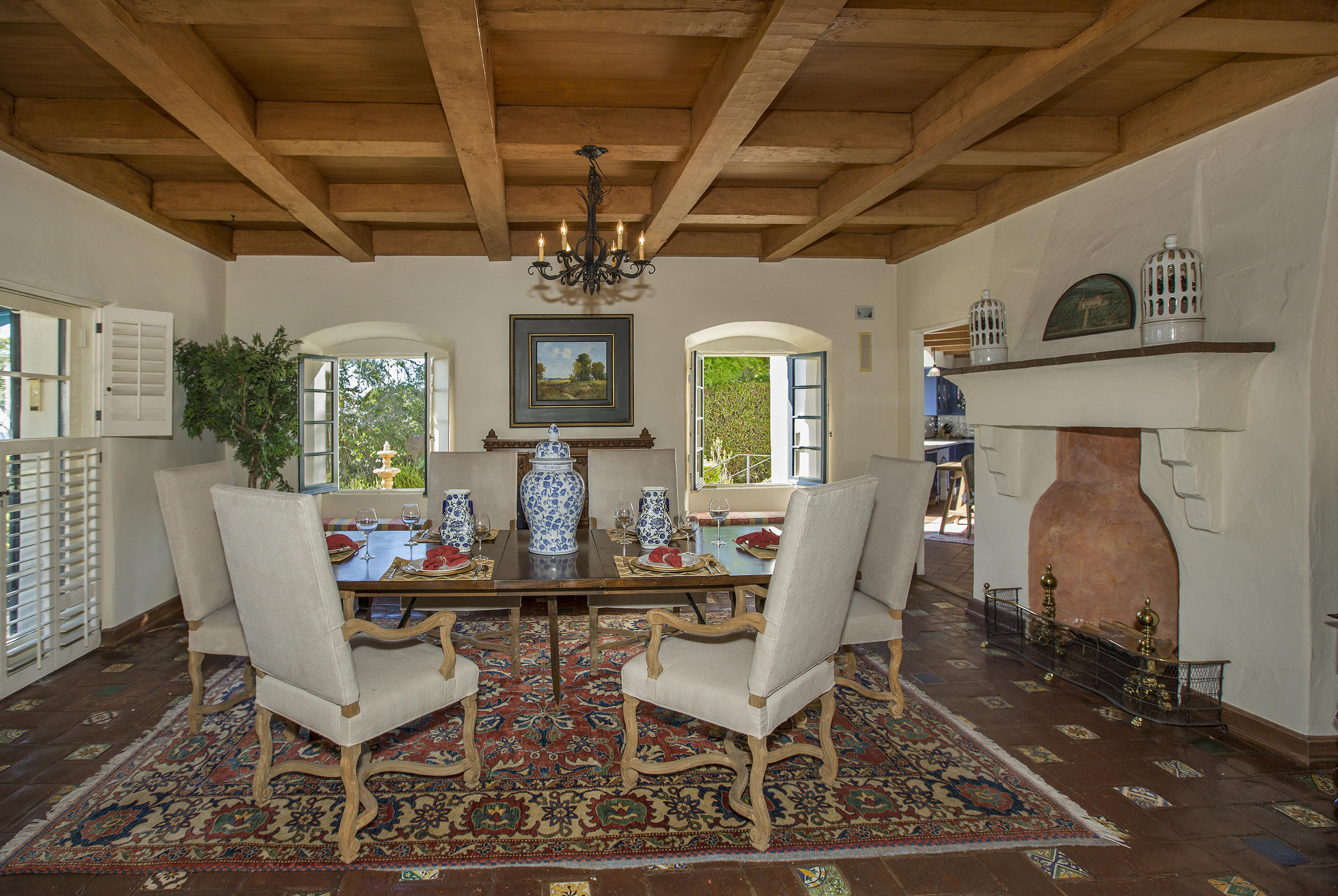 1919 Las Tunas Road Santa Barbara, CA 93103 - Photo 11 of 27 a dining room with furniture a chandelier and wooden floor