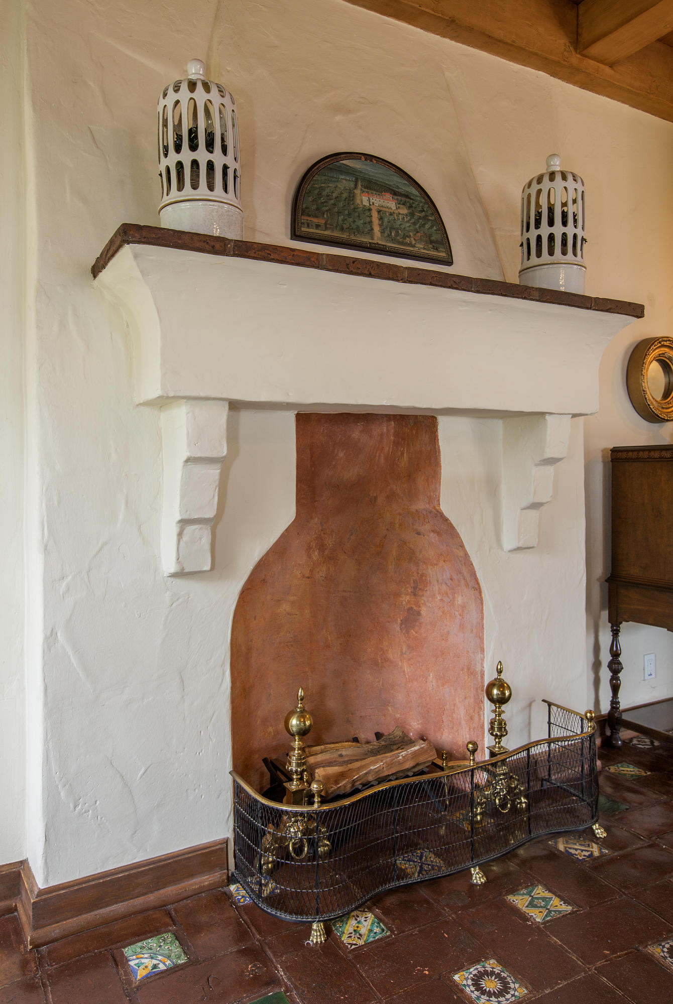 1919 Las Tunas Road Santa Barbara, CA 93103 - Photo 12 of 27 a room with a table and a fireplace