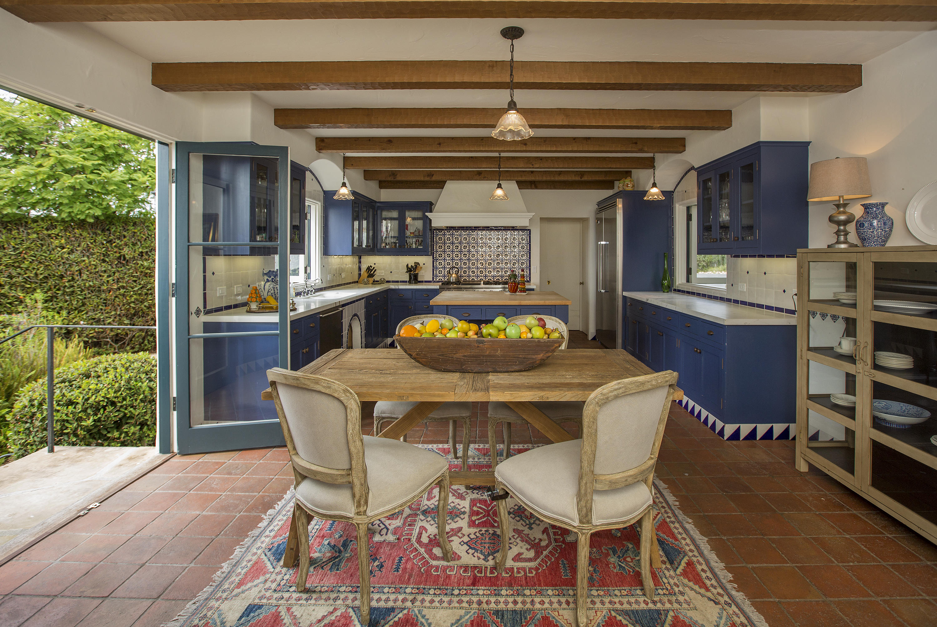1919 Las Tunas Road Santa Barbara, CA 93103 - Photo 14 of 27 a dining room with furniture and a floor to ceiling window