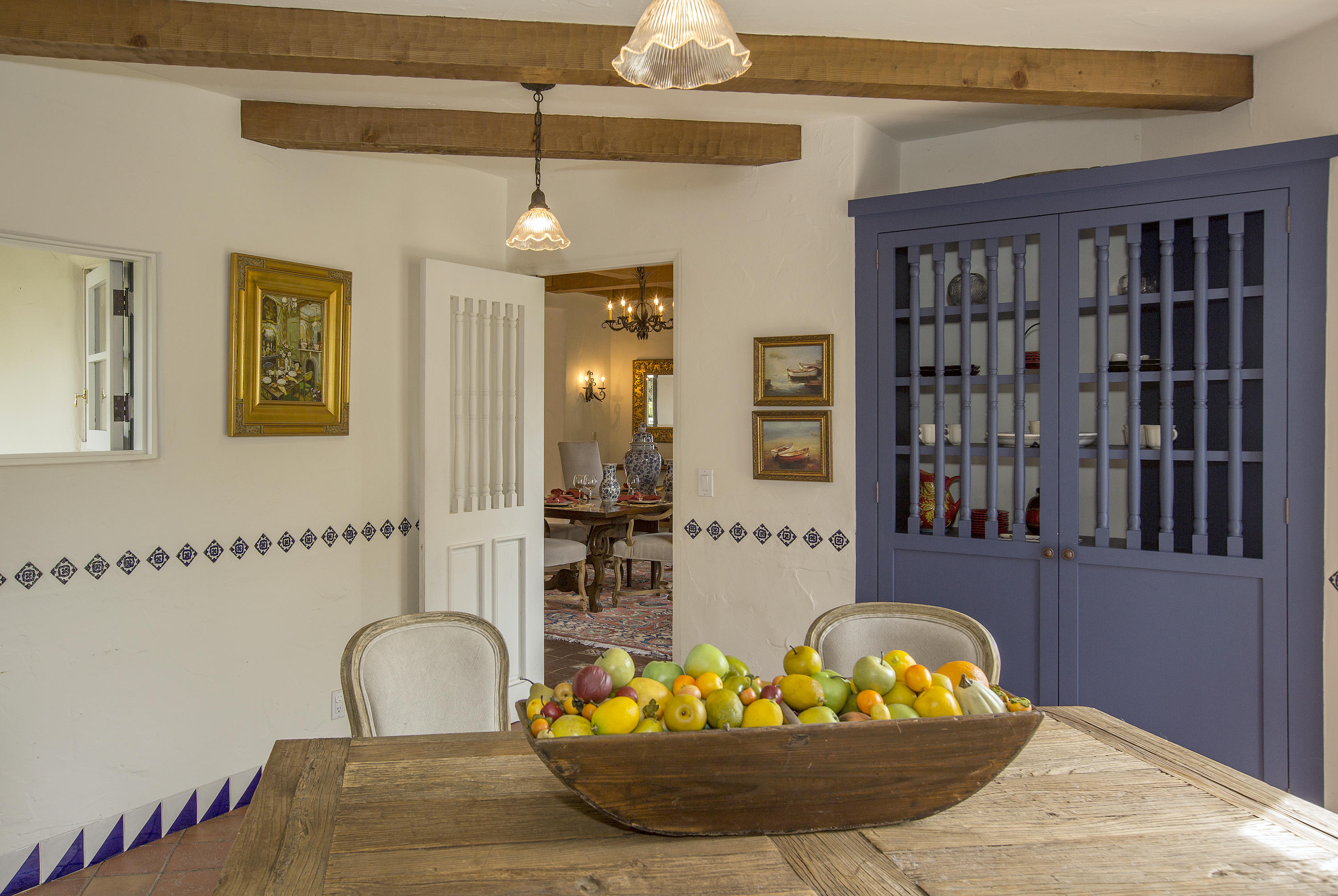1919 Las Tunas Road Santa Barbara, CA 93103 - Photo 16 of 27 a view of a dining room with a table and chairs