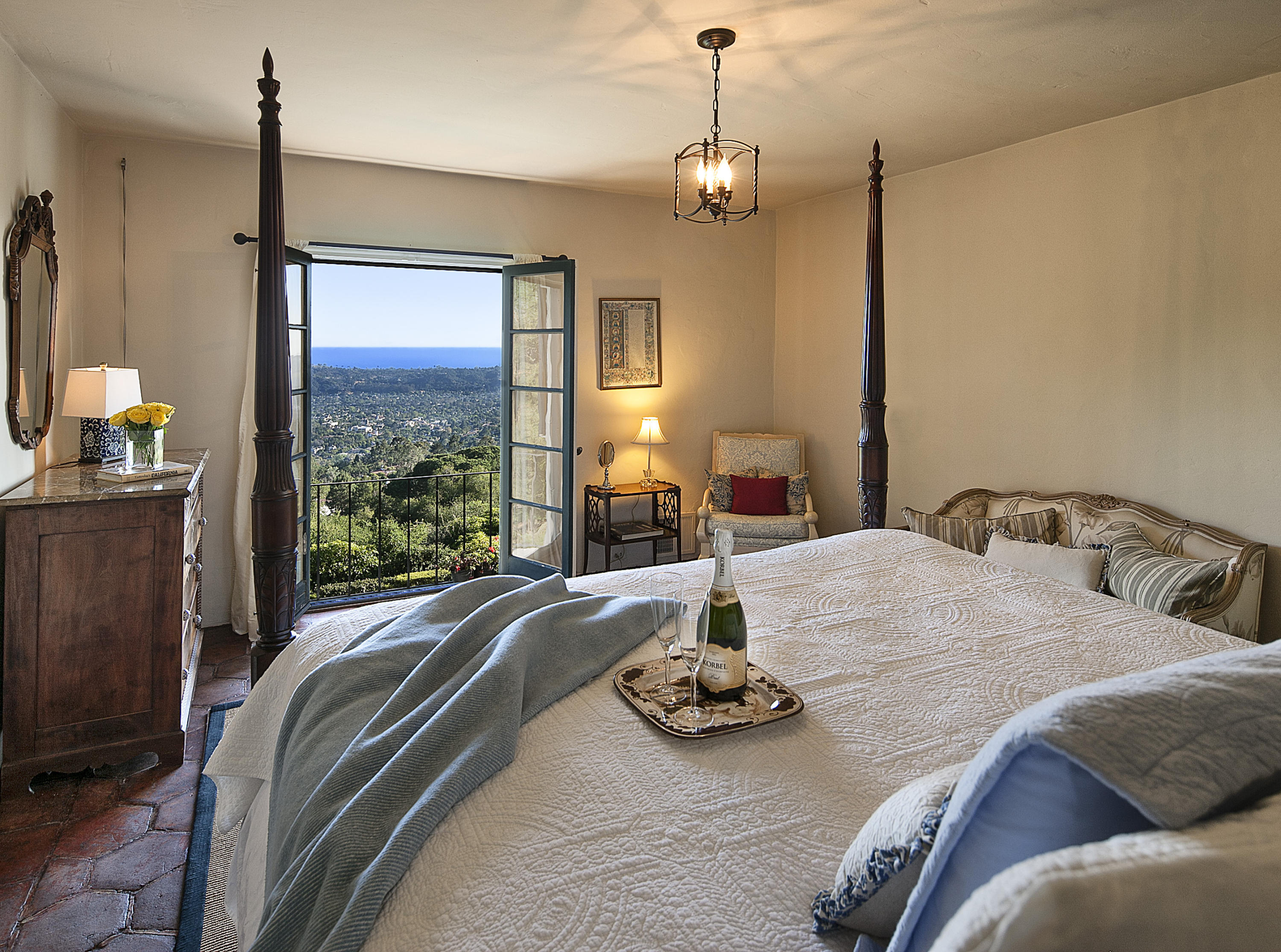 1919 Las Tunas Road Santa Barbara, CA 93103 - Photo 21 of 27 a bed sitting in a room next to a window