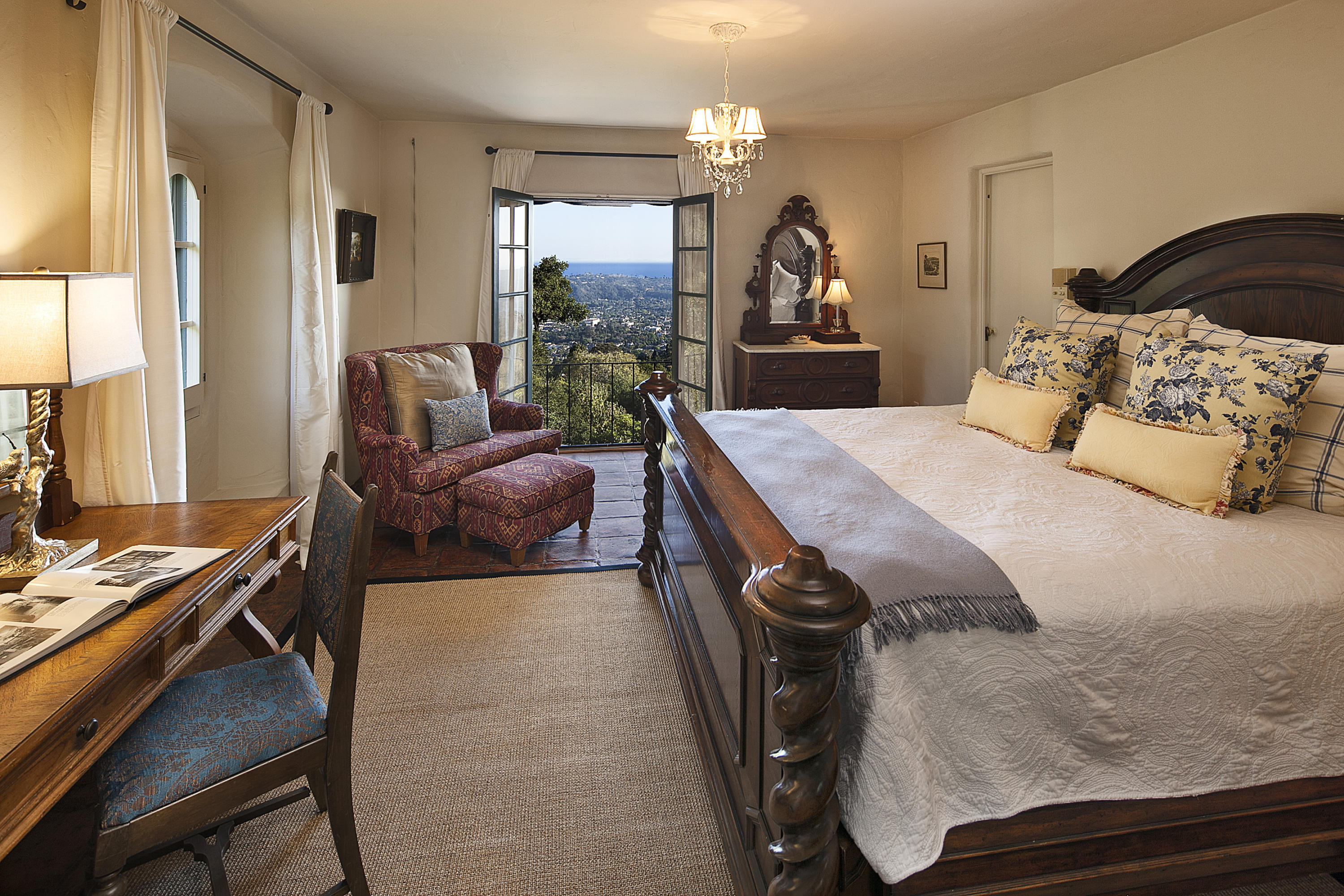 1919 Las Tunas Road Santa Barbara, CA 93103 - Photo 22 of 27 a bedroom with a bed and a large window