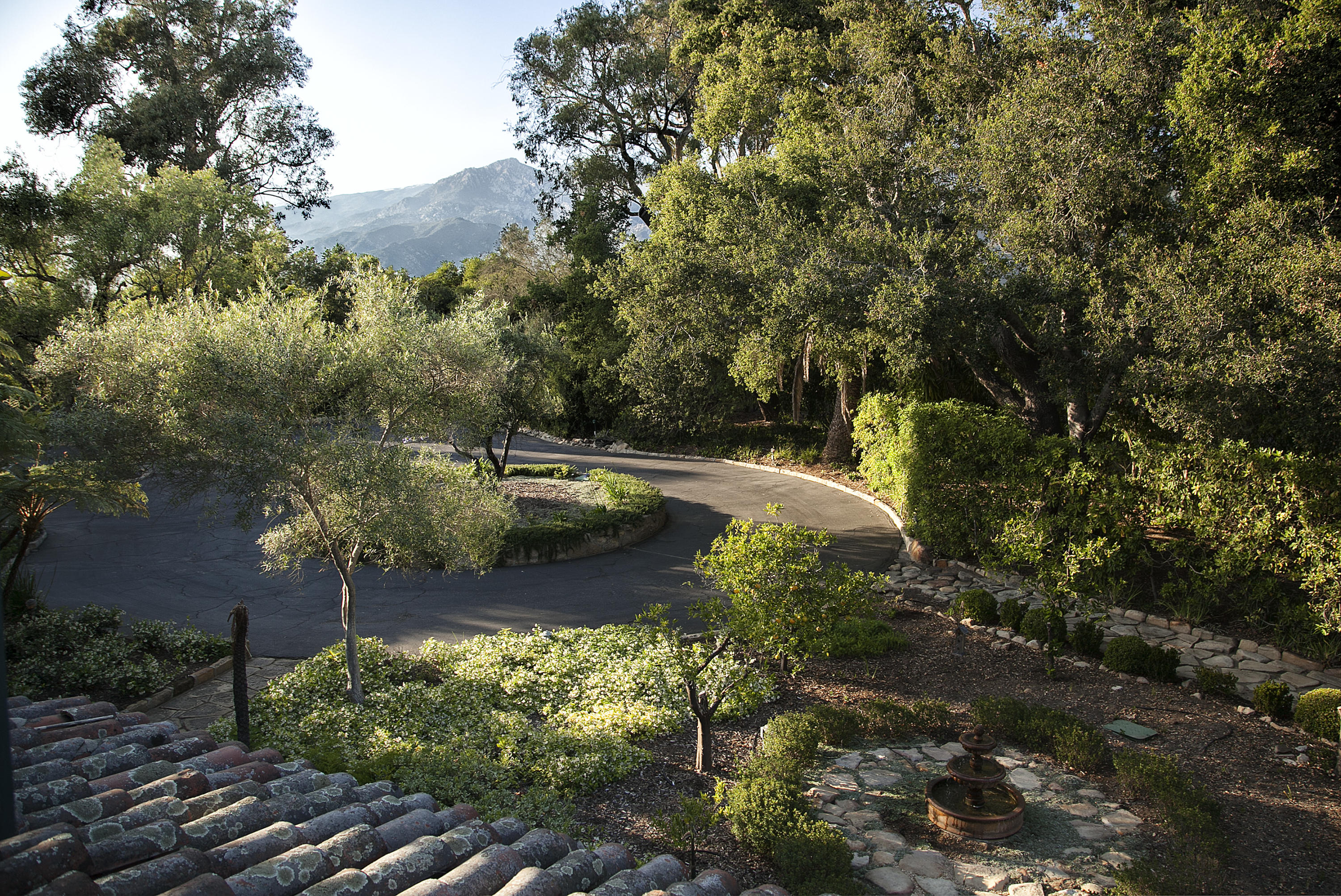1919 Las Tunas Road Santa Barbara, CA 93103 - Photo 5 of 27 a view of a lake with large trees