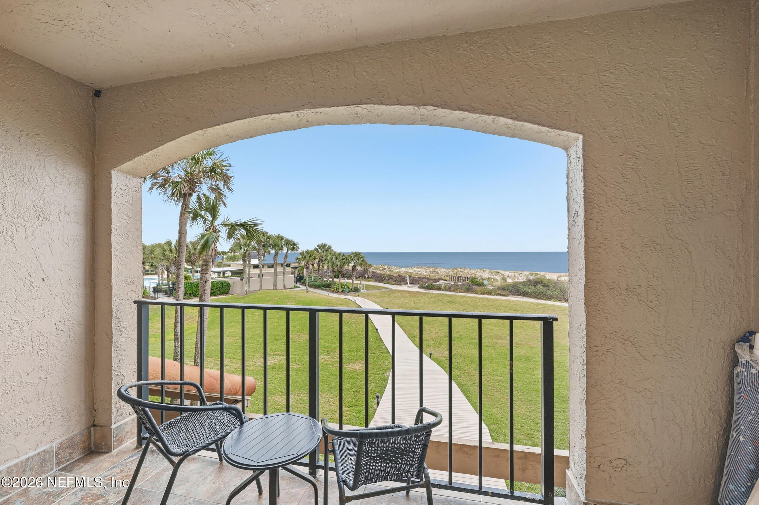 1817 Turtle Dunes Place Fernandina Beach, FL 32034 - Photo 17 of 34 a view of a balcony with chairs