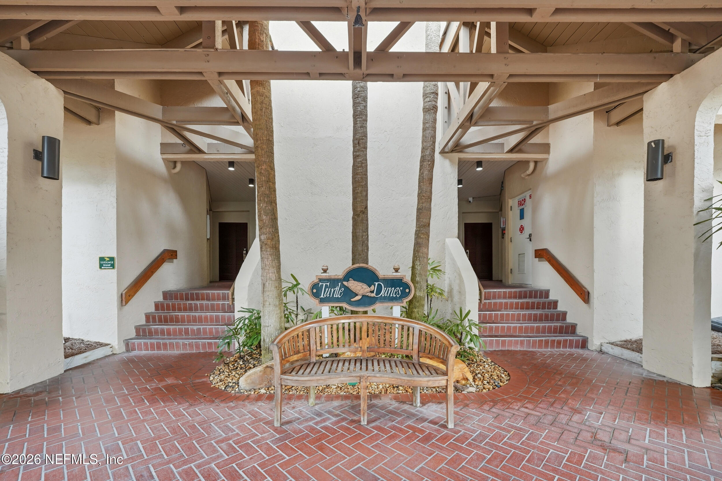 1817 Turtle Dunes Place Fernandina Beach, FL 32034 - Photo 2 of 34 a workspace with wooden floor and windows