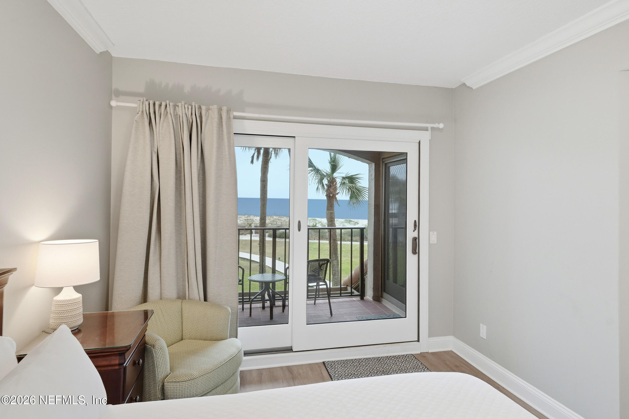 1817 Turtle Dunes Place Fernandina Beach, FL 32034 - Photo 23 of 34 a living room with furniture and a window