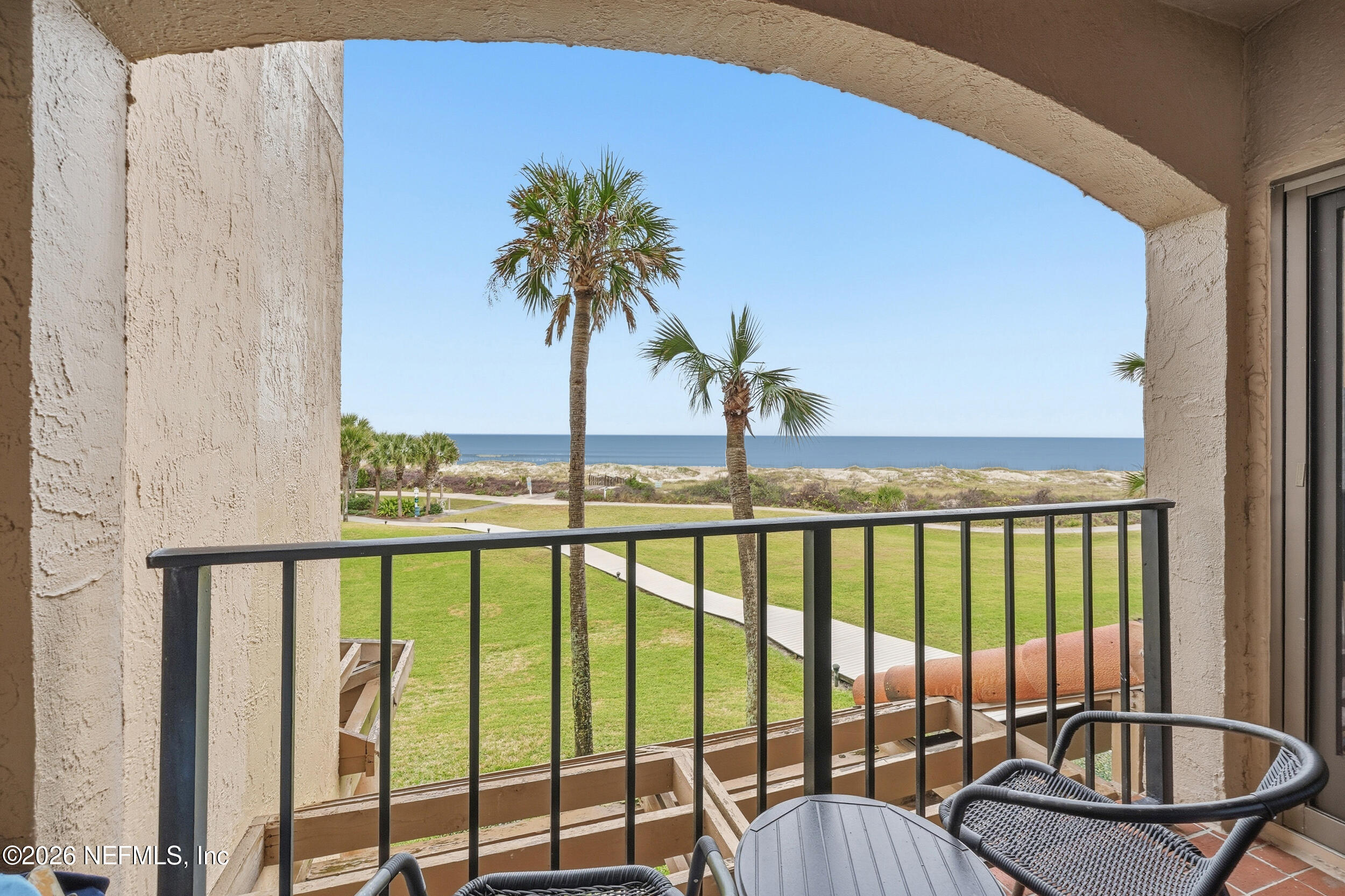 1817 Turtle Dunes Place Fernandina Beach, FL 32034 - Photo 26 of 34 a view of a balcony with chairs