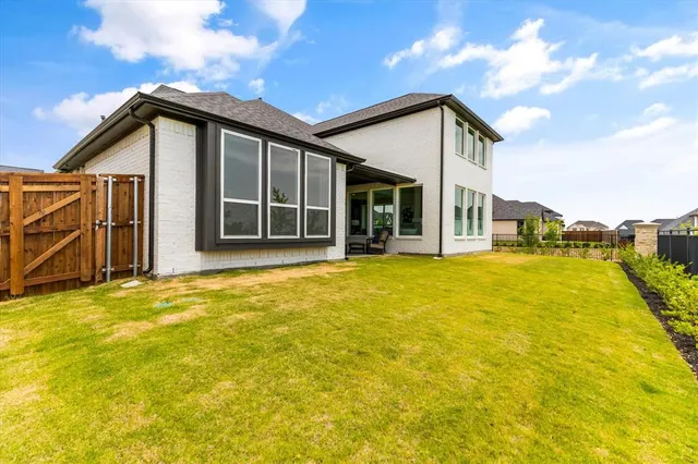 a view of swimming pool with seating area