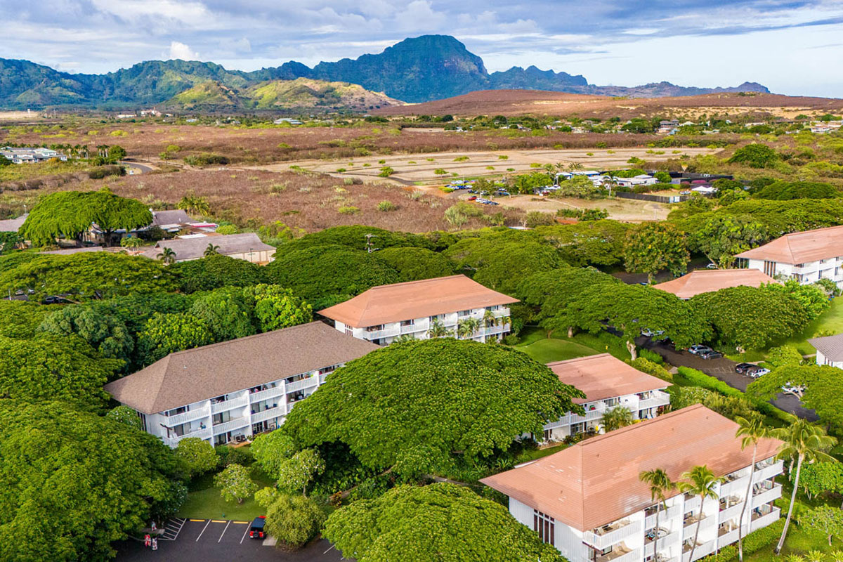 2253 Poipu Road, Unit 230 Koloa, HI 96756 - Photo 26 of 27 an aerial view of a city with lots of residential buildings ocean and mountain view in back