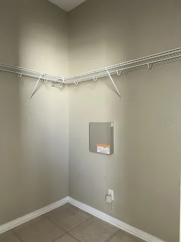 a view of a room with racks on the wall