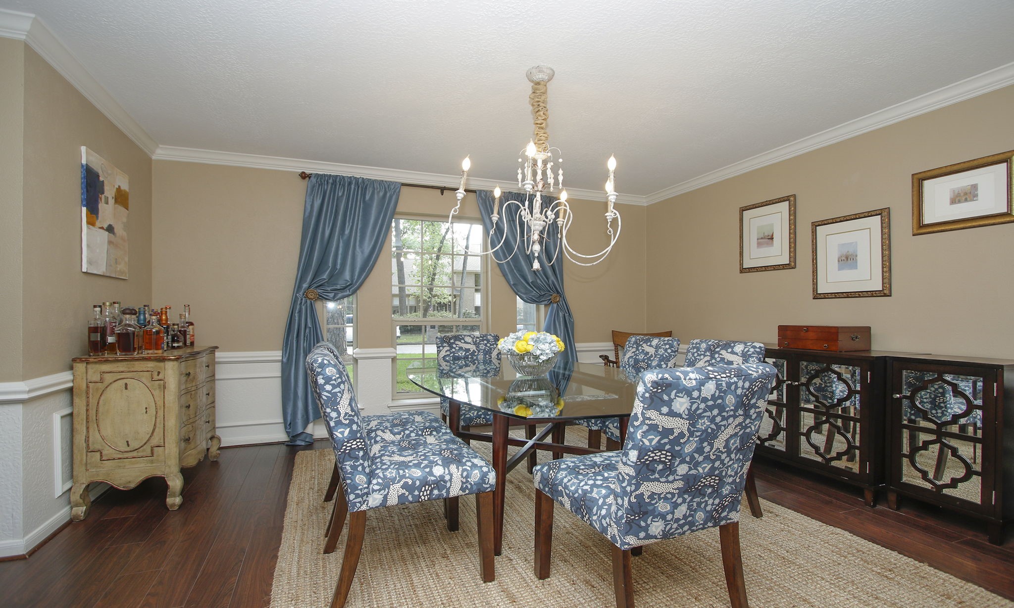 9546 Enstone Circle Spring, TX 77379 - Photo 16 of 44 a view of a dining room with furniture and wooden floor
