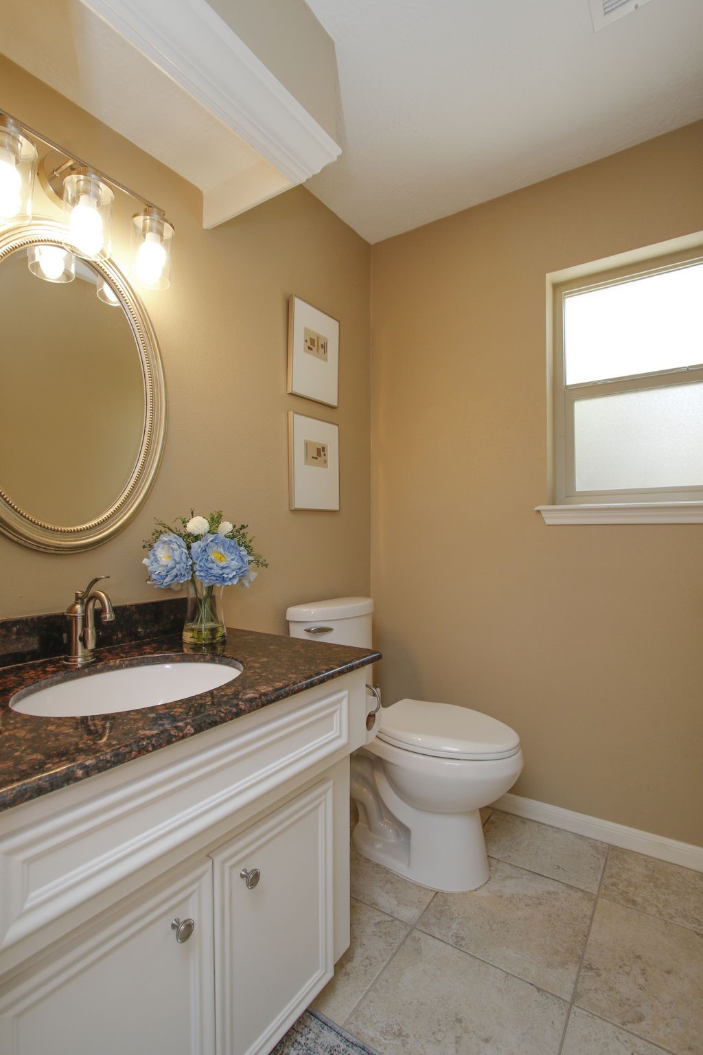 9546 Enstone Circle Spring, TX 77379 - Photo 25 of 44 This charming powder bathroom has granite vanity.