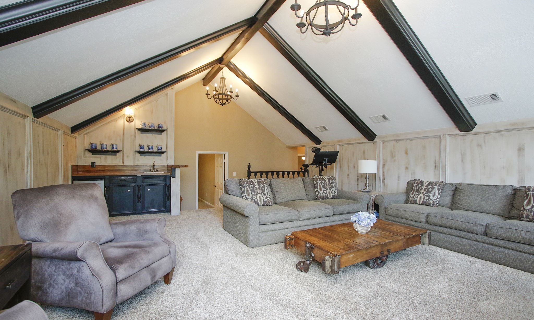 9546 Enstone Circle Spring, TX 77379 - Photo 32 of 44 a living room with furniture and a fireplace