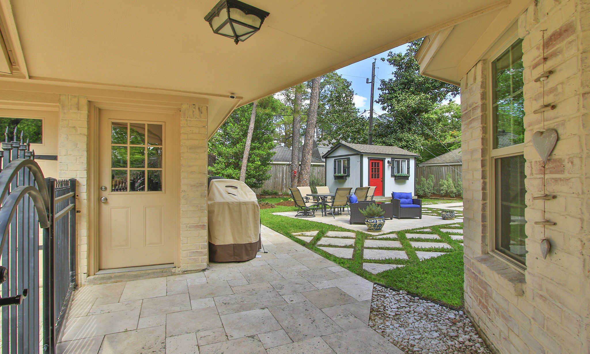 9546 Enstone Circle Spring, TX 77379 - Photo 36 of 44 Through the new wrought iron gate is this great view of the backyard.