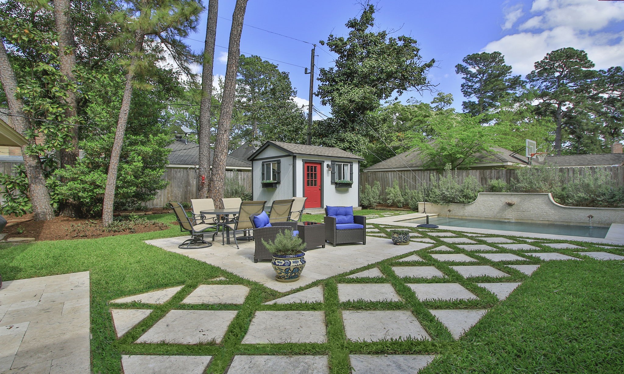 9546 Enstone Circle Spring, TX 77379 - Photo 37 of 44 This backyard is amazing with Travertine tile patio.