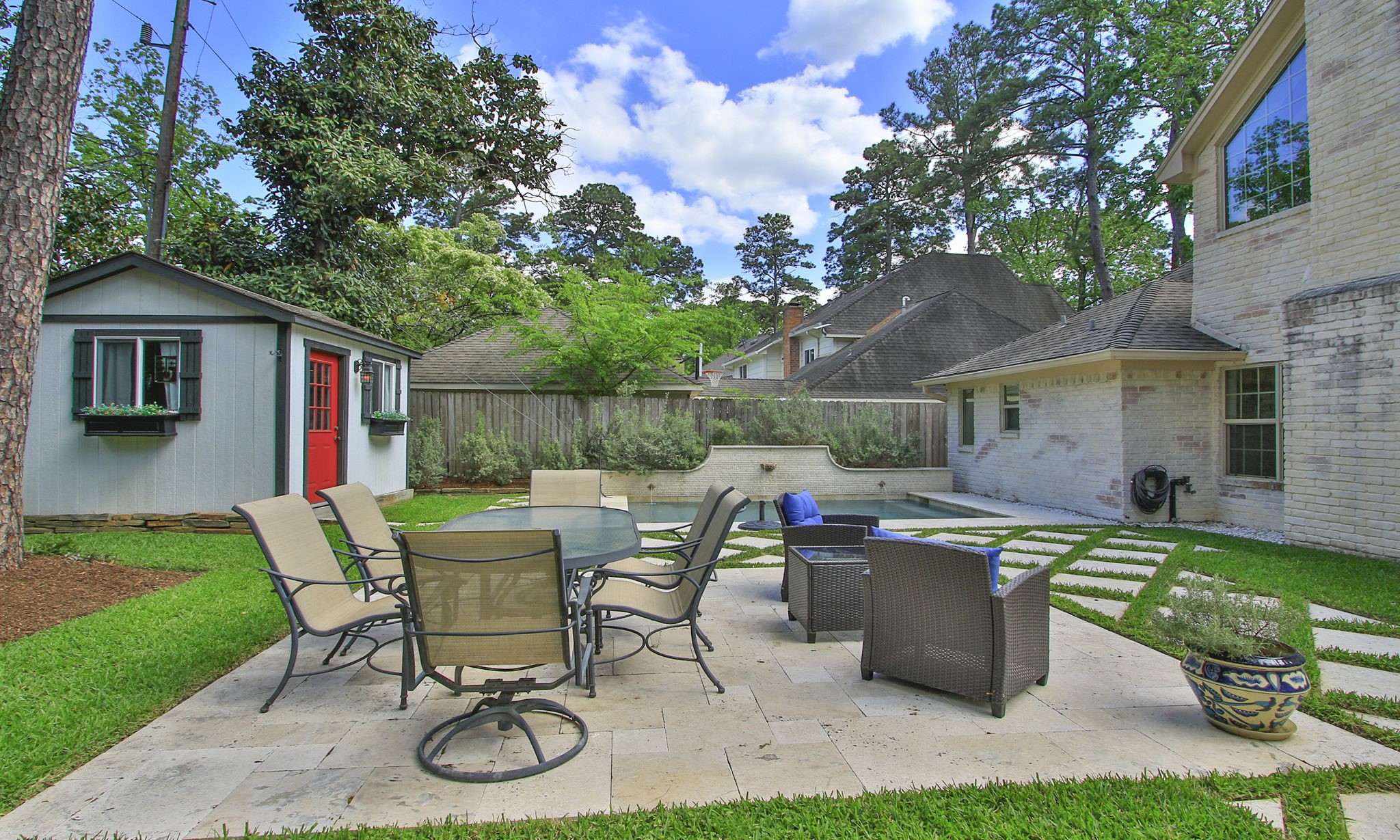 9546 Enstone Circle Spring, TX 77379 - Photo 38 of 44 Another view of the patio shows the amount of furniture the patio will accommodate.