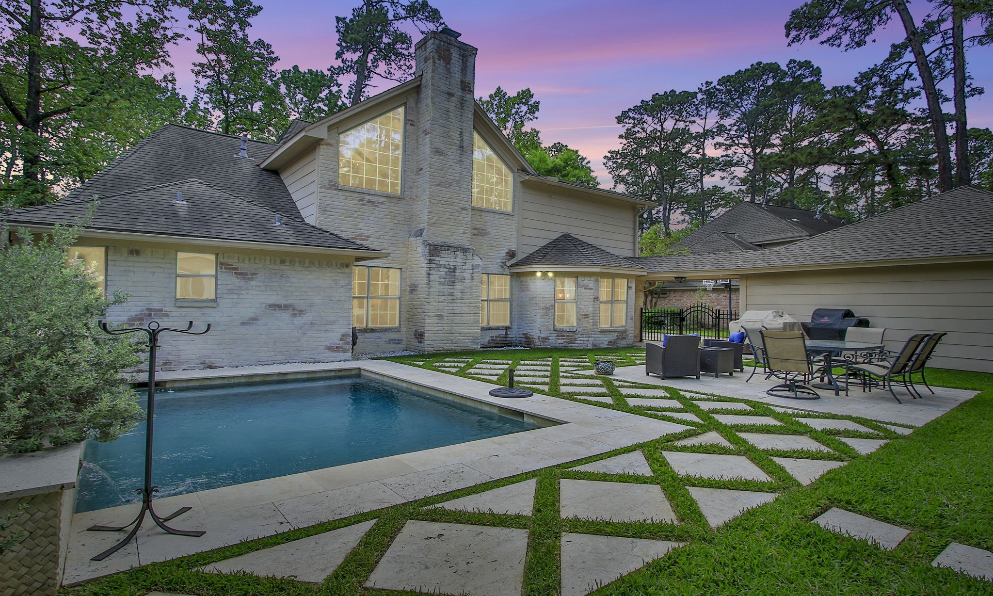 9546 Enstone Circle Spring, TX 77379 - Photo 44 of 44 a view of a house with pool and chairs