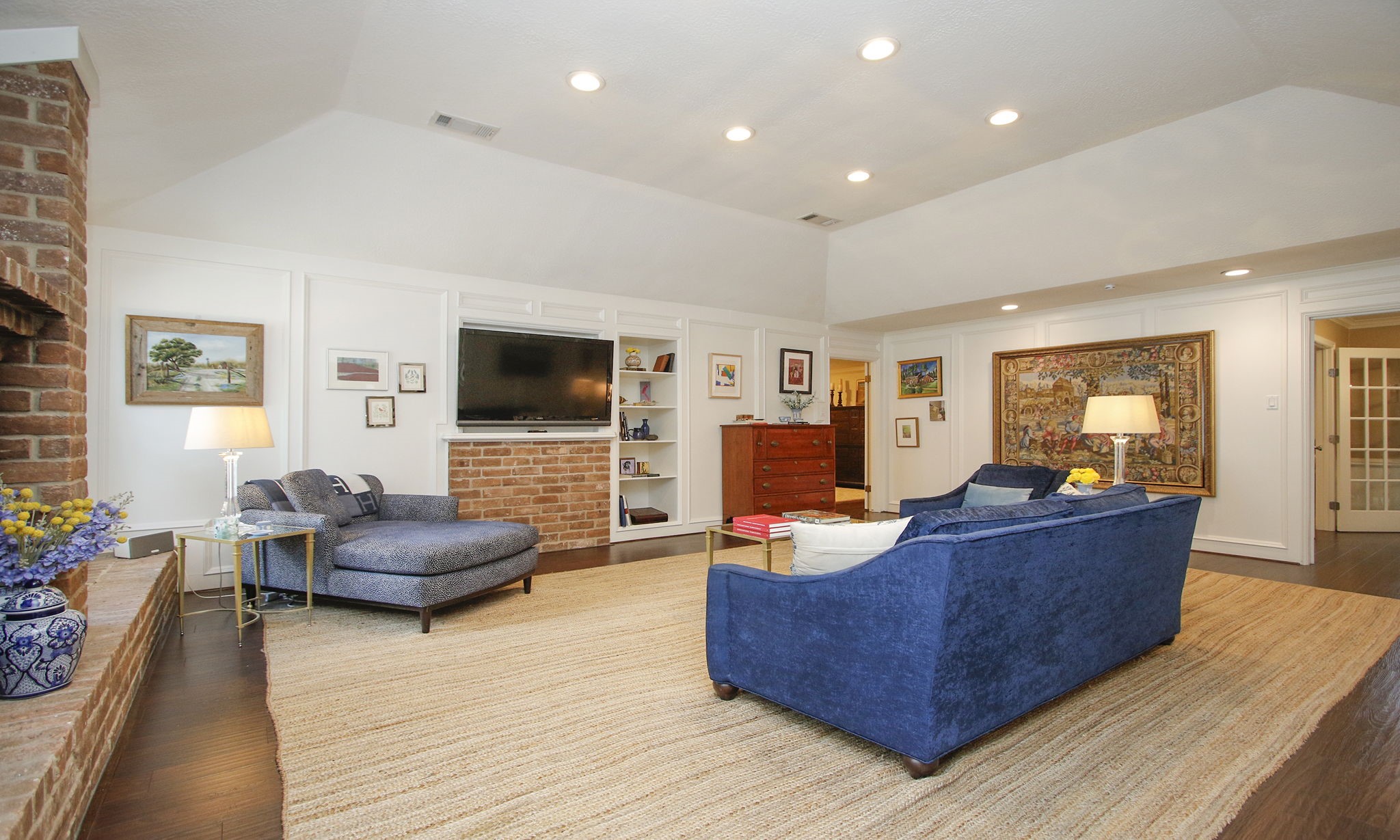 9546 Enstone Circle Spring, TX 77379 - Photo 9 of 44 Remodeled den with repurposed former wet bar where brick, TV and shelves now live.