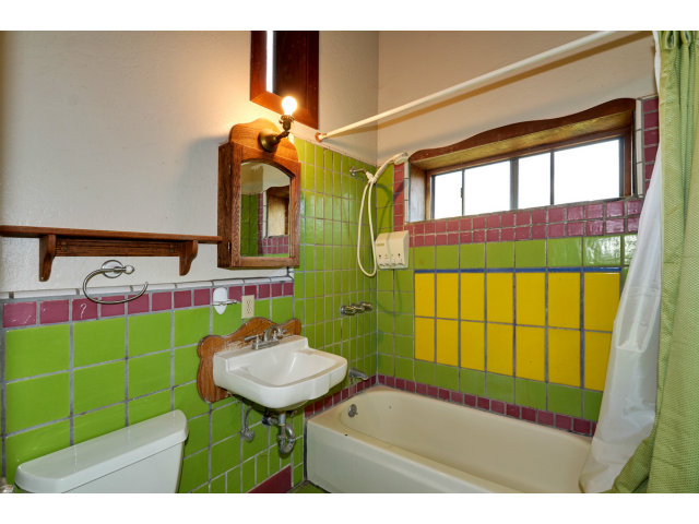 139 Bohnen Road Santa Cruz, CA 95065 - Photo 11 of 25 a bathroom with a sink mirror and a window