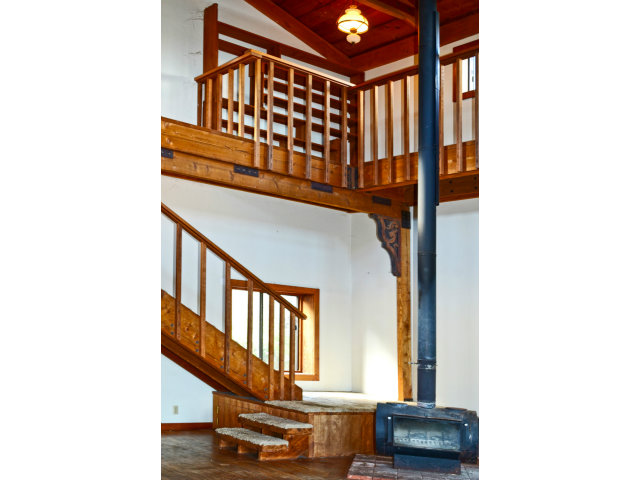 139 Bohnen Road Santa Cruz, CA 95065 - Photo 22 of 25 a view of staircase with black and white walls