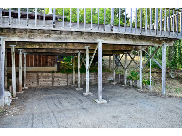 139 Bohnen Road Santa Cruz, CA 95065 - Photo 25 of 25 a view of a porch with a table and chairs next to a yard