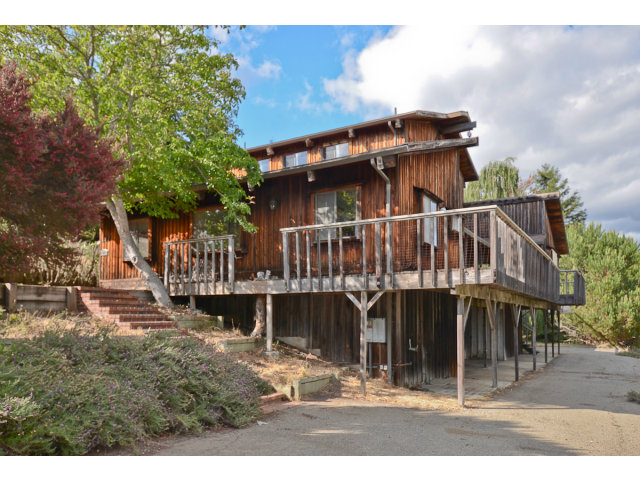 139 Bohnen Road Santa Cruz, CA 95065 - Photo 4 of 25 a view of a house with a wooden deck