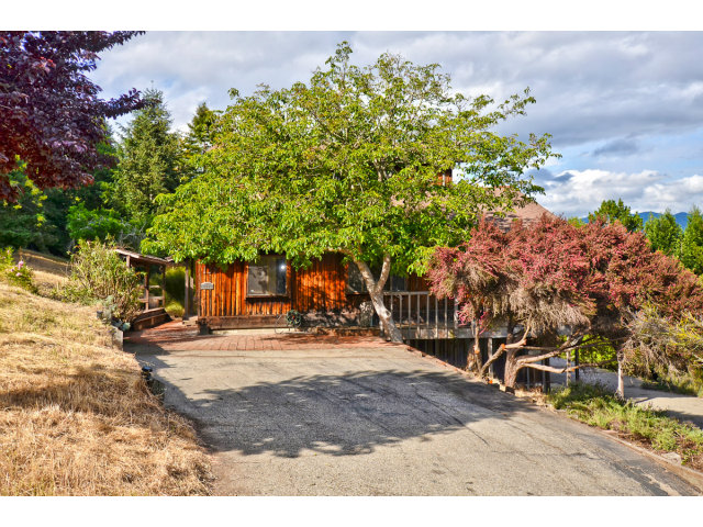 139 Bohnen Road Santa Cruz, CA 95065 - Photo 6 of 25 a backyard of a house with table and chairs