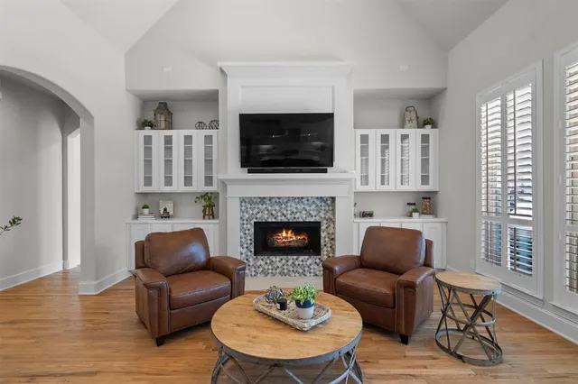a kitchen with granite countertop a stove and a cabinets