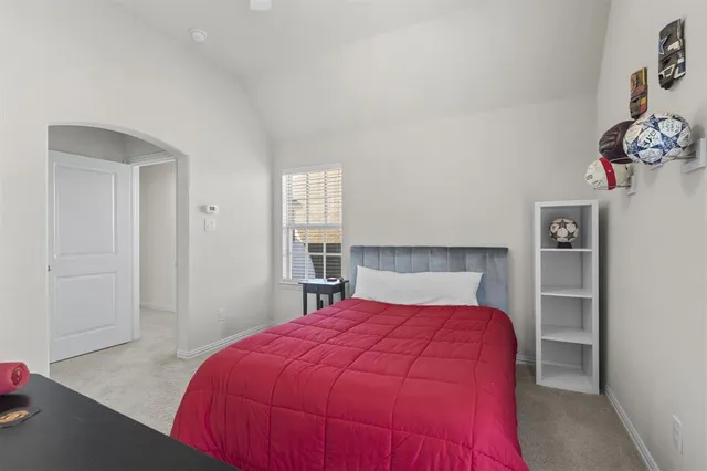 a view of house that has a yard