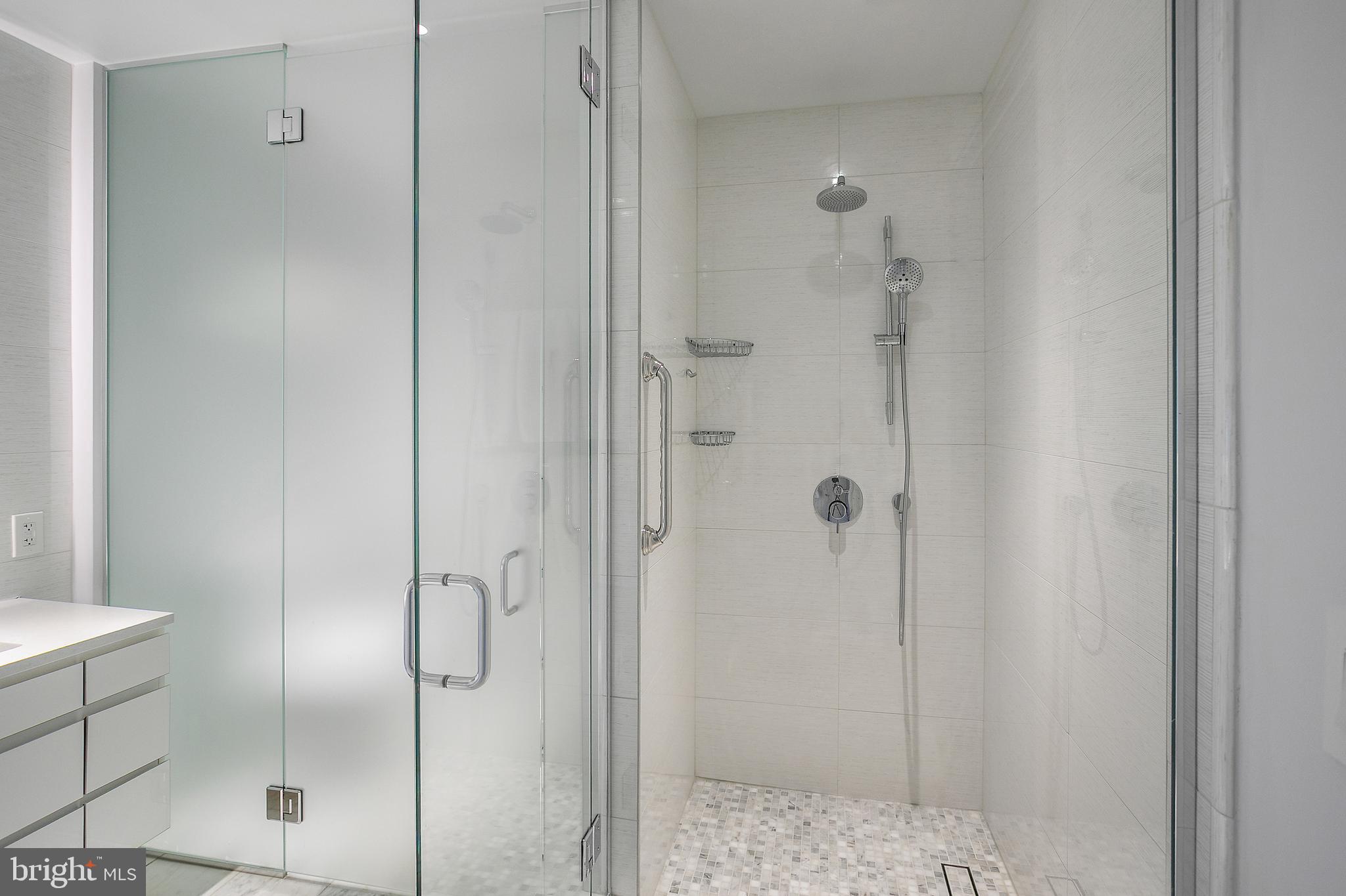 2501 M Street Northwest, Unit T12 Washington, DC 20037 - Photo 41 of 46 a bathroom with a shower