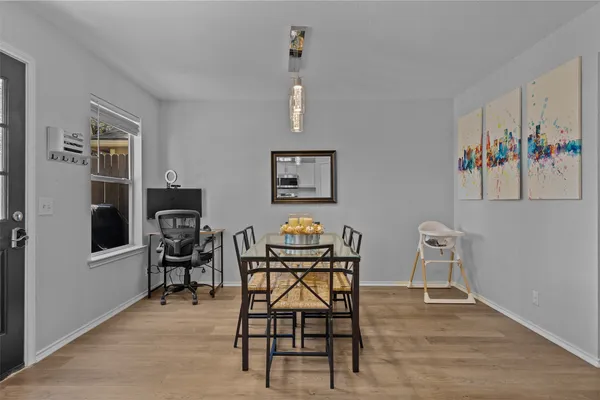 a view of a workspace with furniture and lounge chair