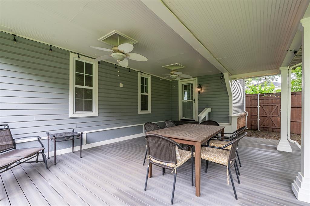 9121 6th Street Frisco, TX 75033 - Photo 23 of 27 a patio with wooden floor and outdoor seating