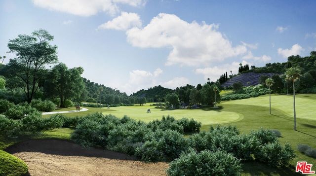 a view of a lake with a big yard