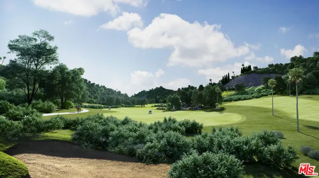 a view of a lake with a big yard