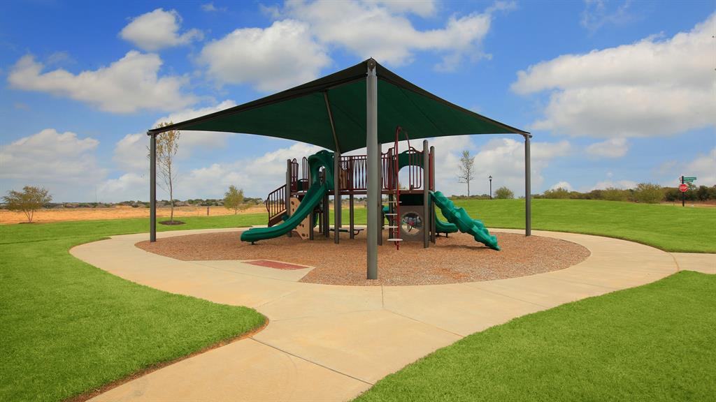 809 Running Iron Trail Mansfield, TX 76063 - Photo 8 of 12 a view of a park with slide