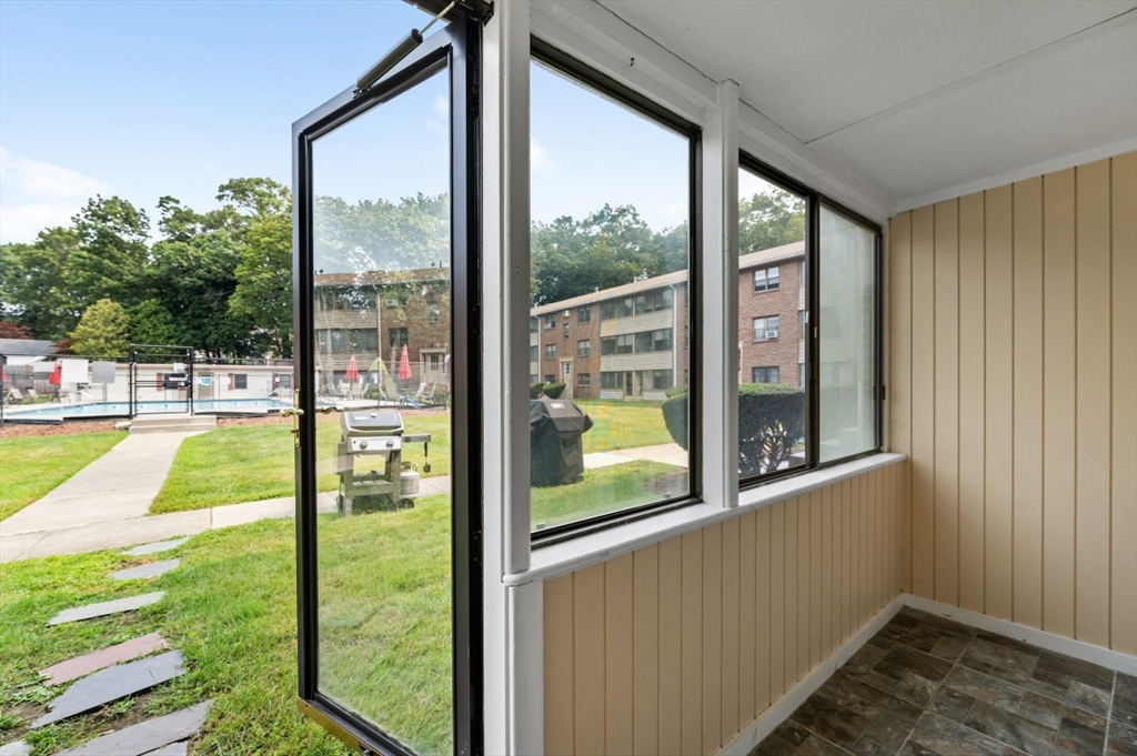 68 Preston Street, Unit 5F Wakefield, MA 01880 - Photo 15 of 20 a view of swimming pool from a living room